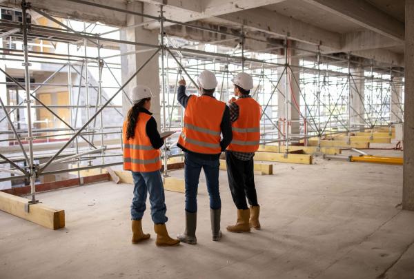 three construction workers