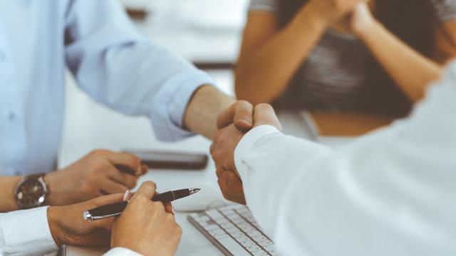 Two businessmen shaking hands