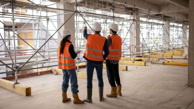 three construction workers