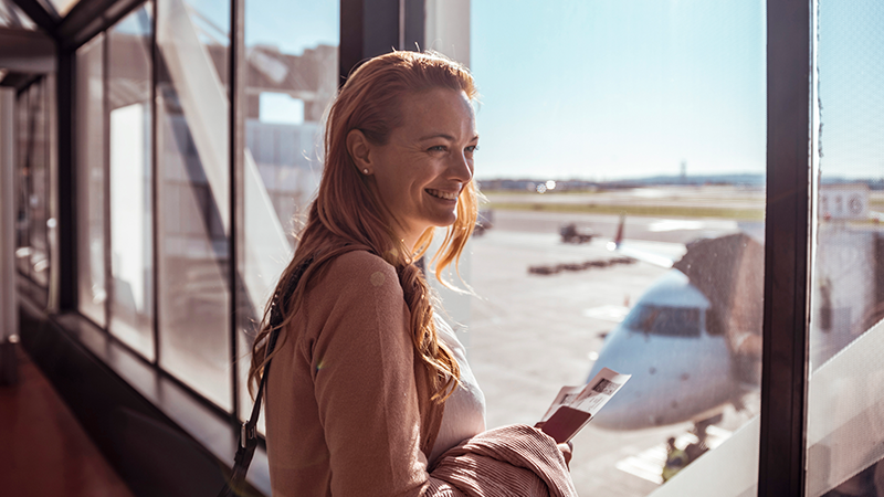 HW-woman-looking-at-plane