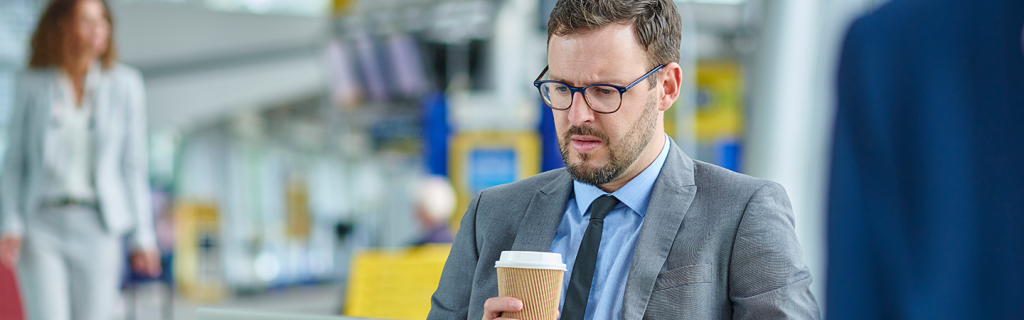 Concerned looking man in airport