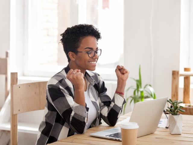 Woman happy her trip has been approved