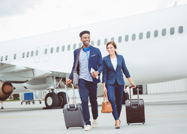 Travellers walking off a plane