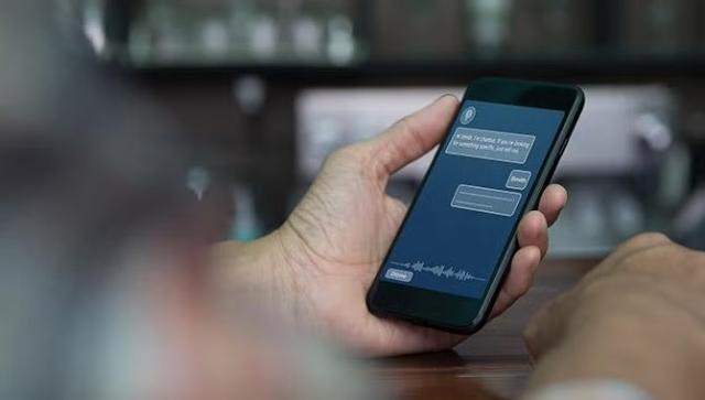 Man holding phone how Artificial intelligence is rapidly taking hold in the travel industry. 